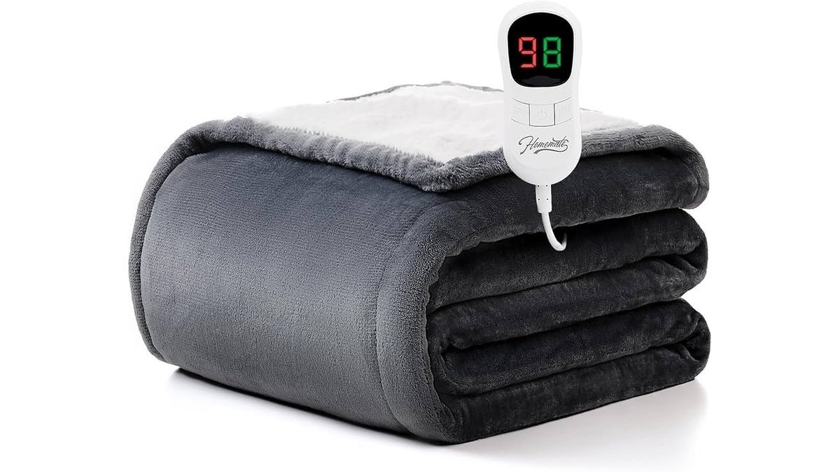 A soft heated blanket draped over a cozy armchair during a winter morning.