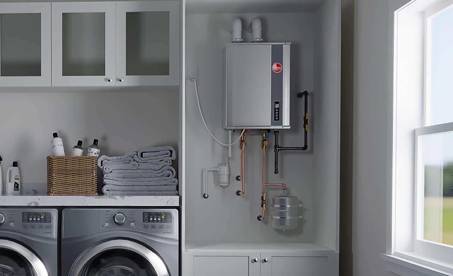 A modern tankless water heater installed on a clean basement wall in a home.